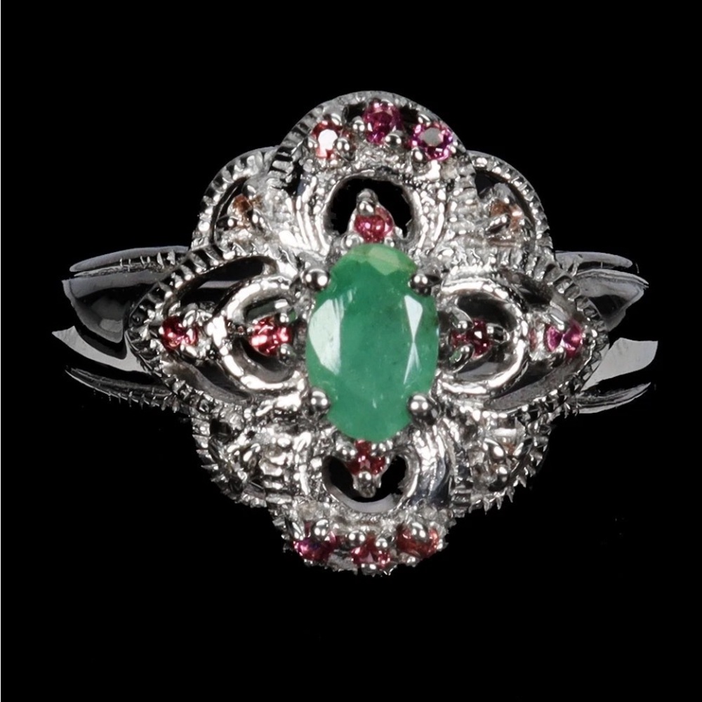Majestic Genuine Emerald Ring Encrusted with Garnets
